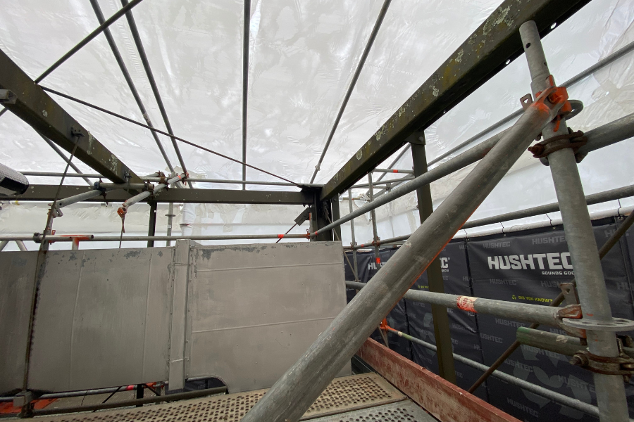 Scaffolding set up as the team prepared to work safely in confined spaces during the early project stages.