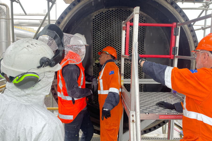 Team preparing pre-heater for automated high-pressure cleaning at Ngawha Generation site.